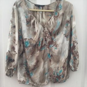 Floral satin blouse. Soft pastel creams and teal
